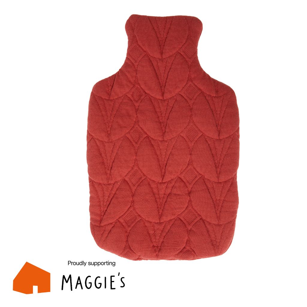 front of coral quilted hot water bottle cover 