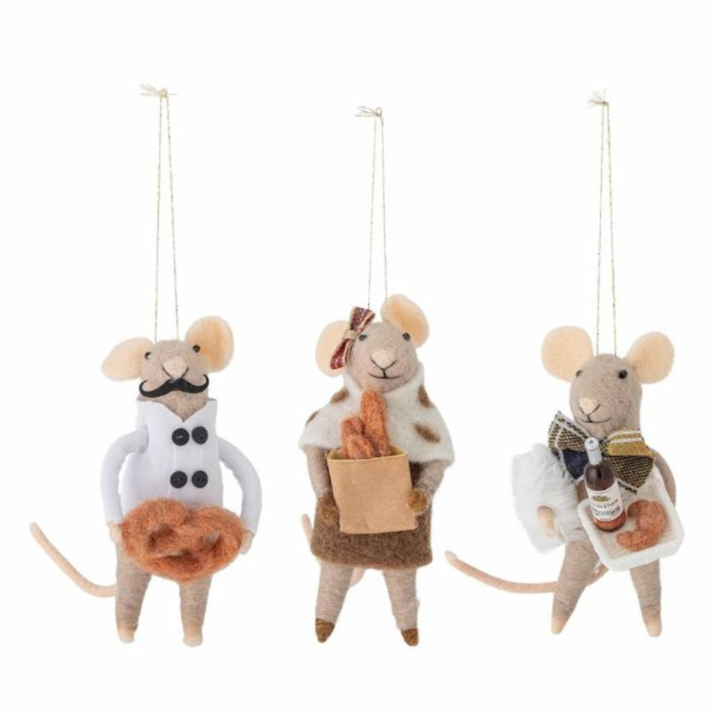 Three decorative mouse figurines with different outfits on a white background