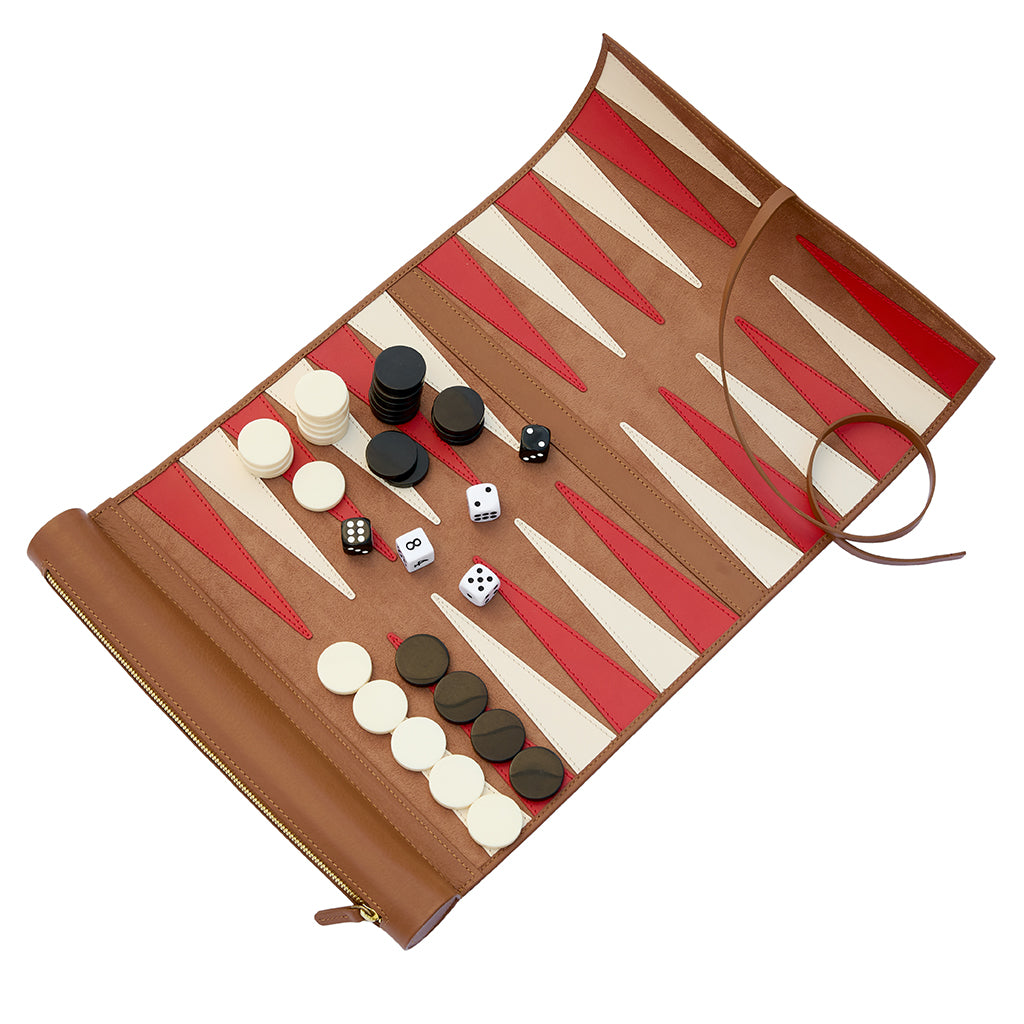 A brown leather backgammon set with red and cream checkers, displayed open on a white background.