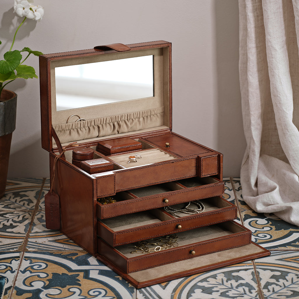 leather jewellery case with internal mirror and drawers with a personalised mini tag and personalised internal boxes