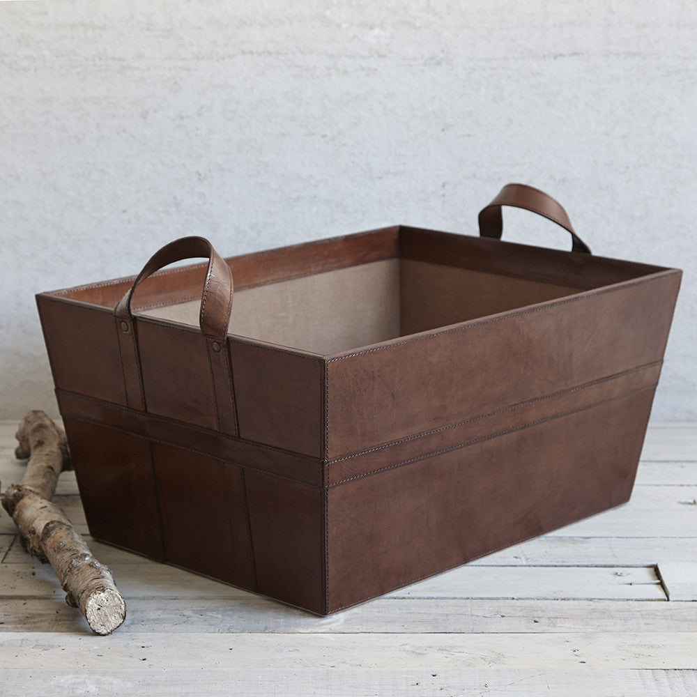 Leather log basket with two carry handles and cotton lining in conker brown