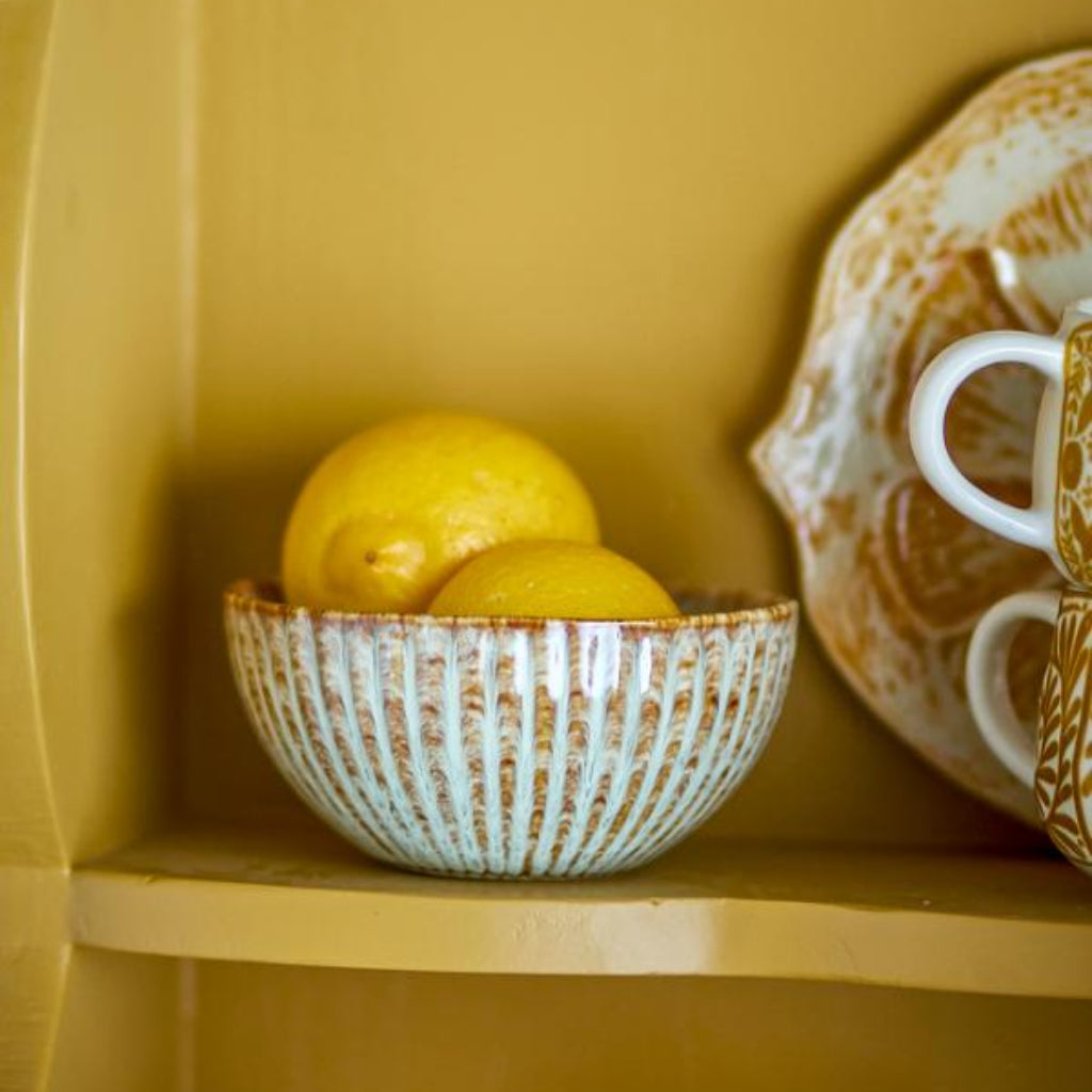 Fleur Bowl on Yellow Shelf