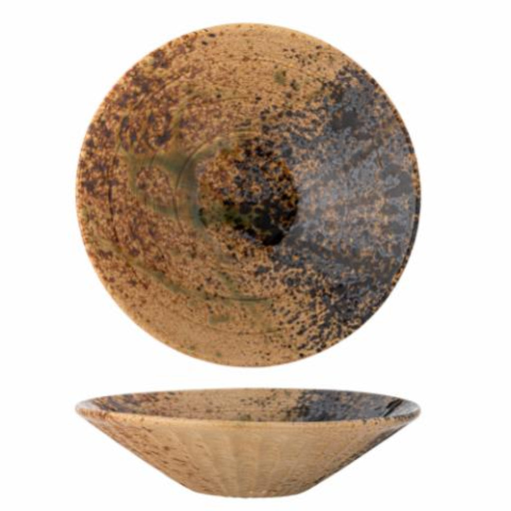 Ceramic bowl with a rustic, speckled finish on a white background