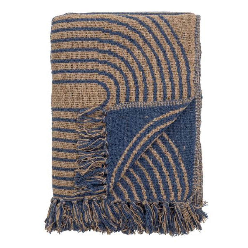 Woven blanket with blue and brown pattern on a white background