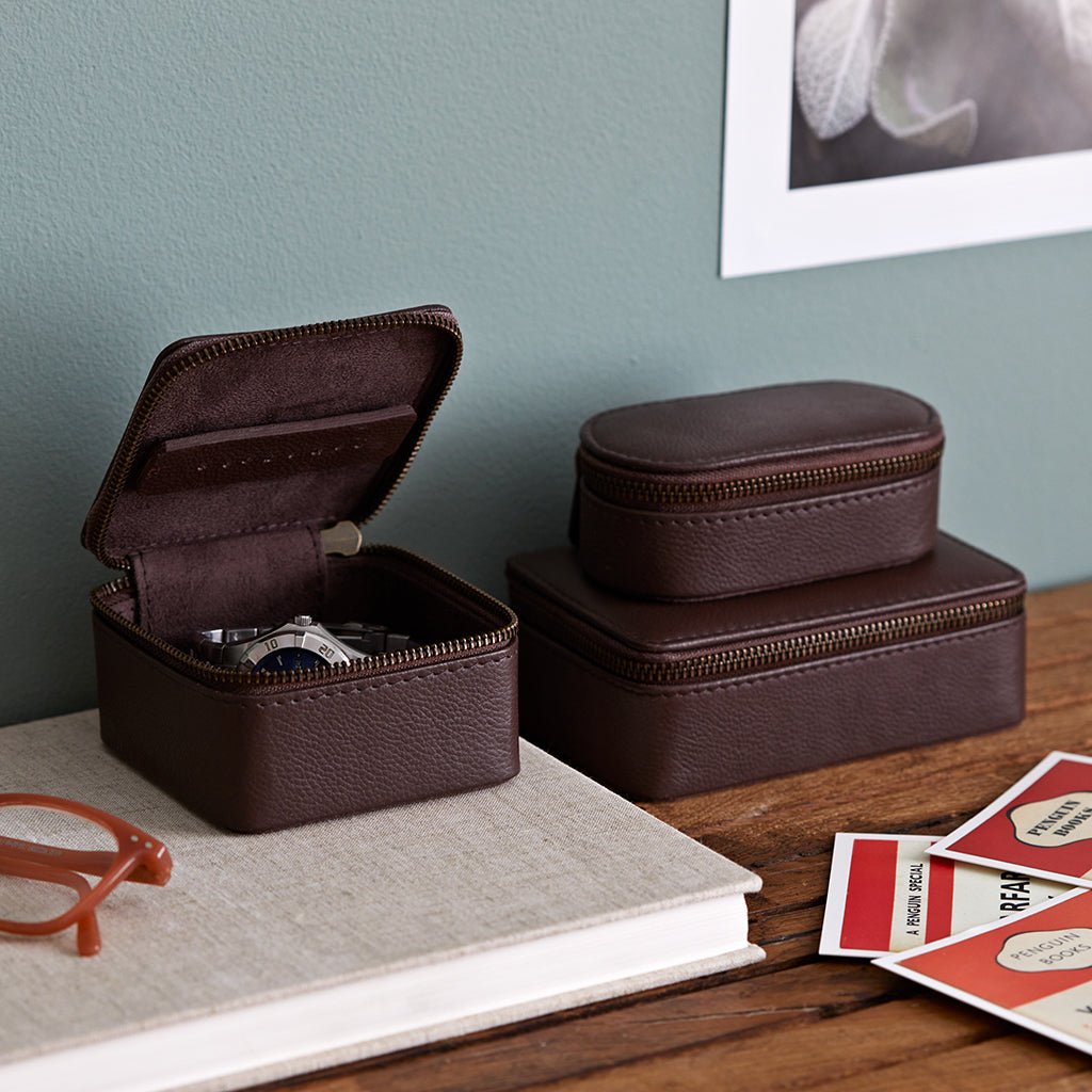 set of three travel cases brown