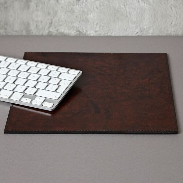Mouse mat in dark chocolate brown with a keyboard