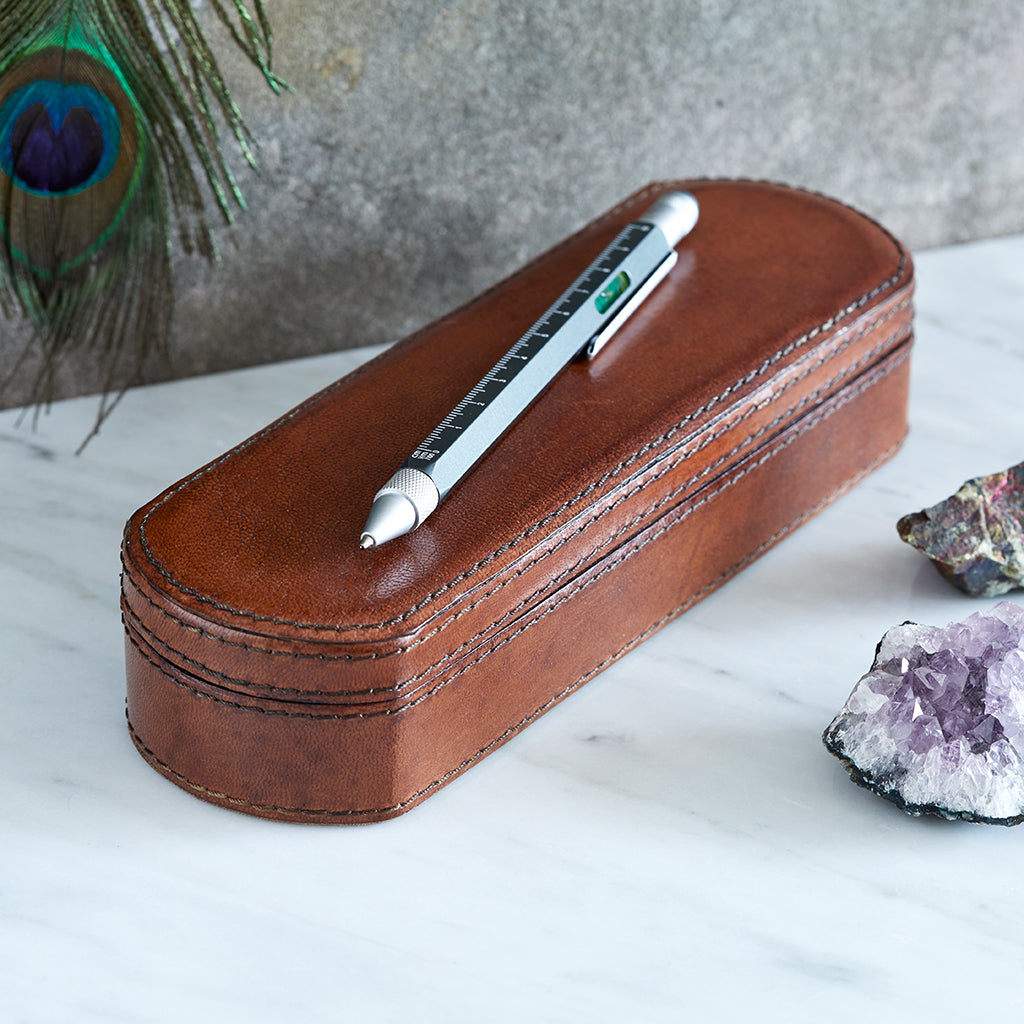 Leather pen box with the lid closed ana pen on top , a special gift for a  loved one