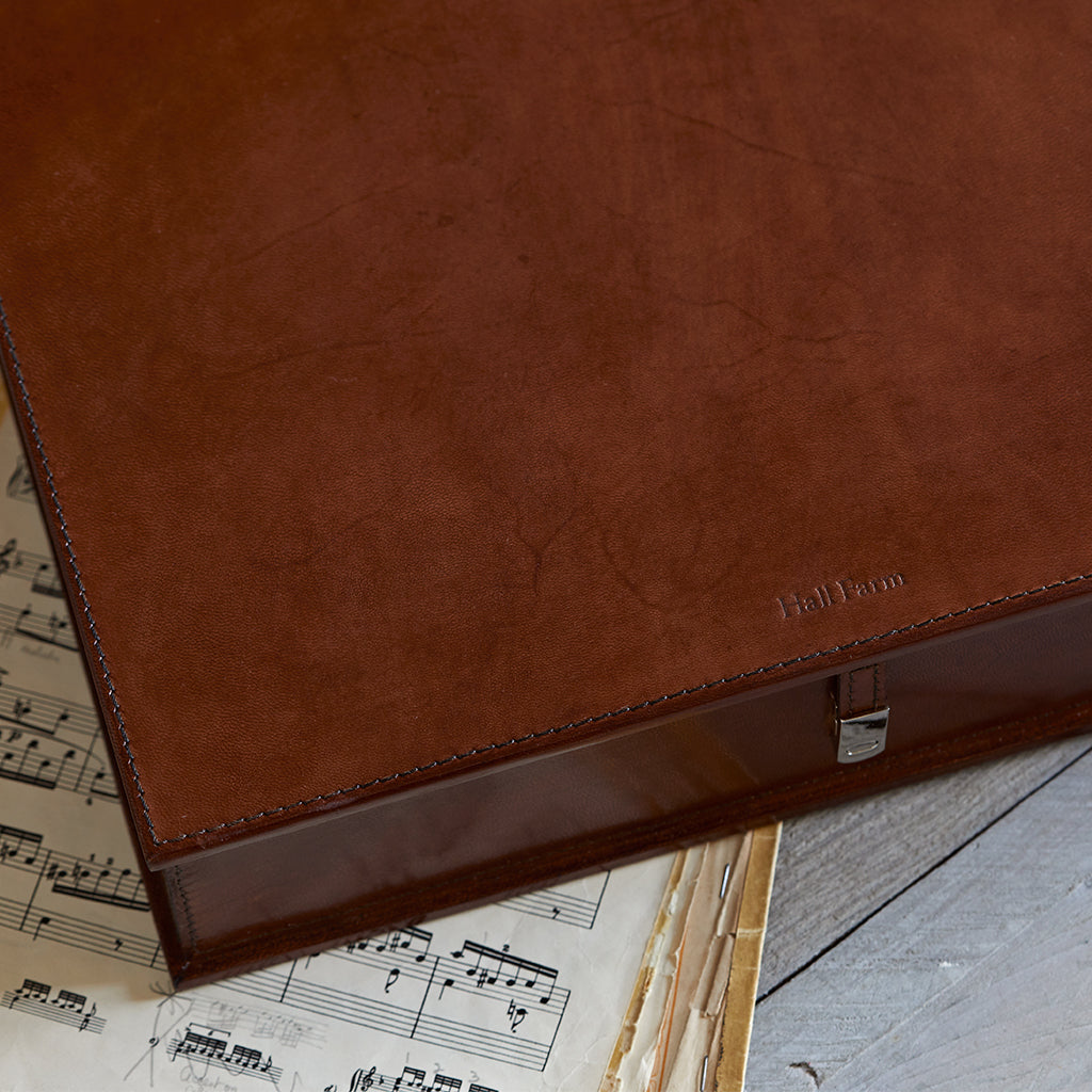 conker brown personalised box file in leather, with embossing shown to the top of the leather box