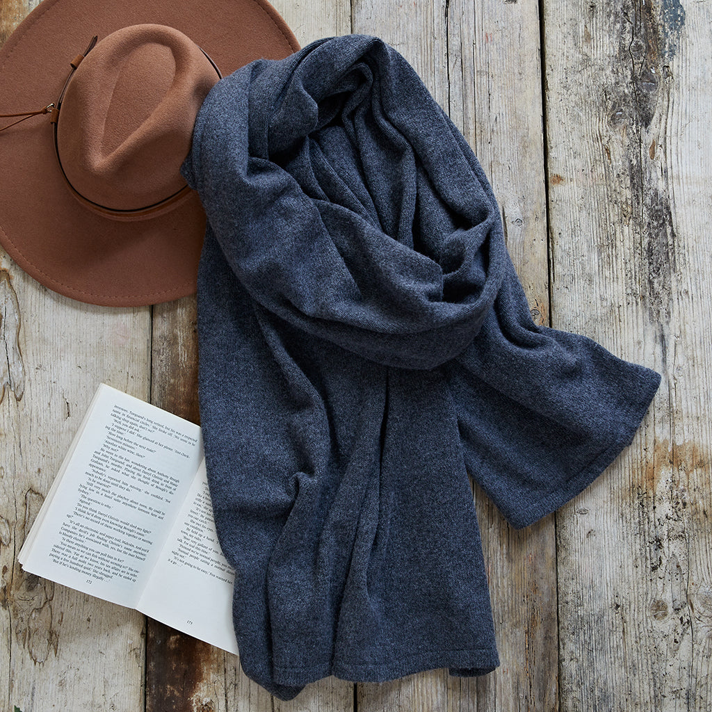 Super soft merino wool wrap in dark storm grey perfect for getting cosy on chillier evenings