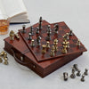 Handcrafted leather chess board, showing the board and the chess pieces on top of the leather carry cacse