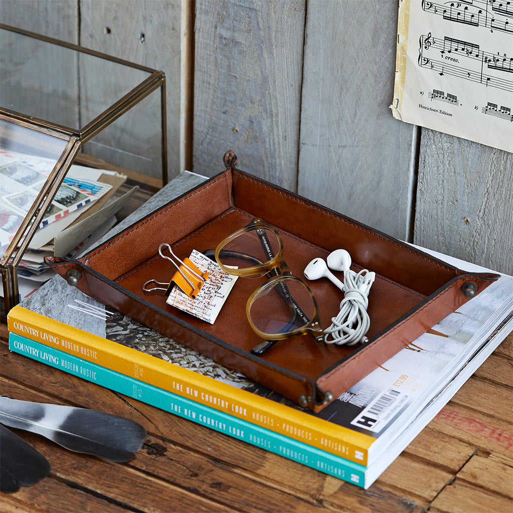 Conker brown leather coin / stash tray shown with items in , perfect for a gif