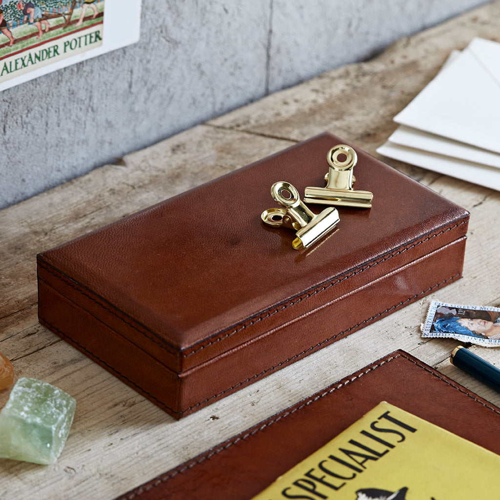 Leather memento gift box closed on desk