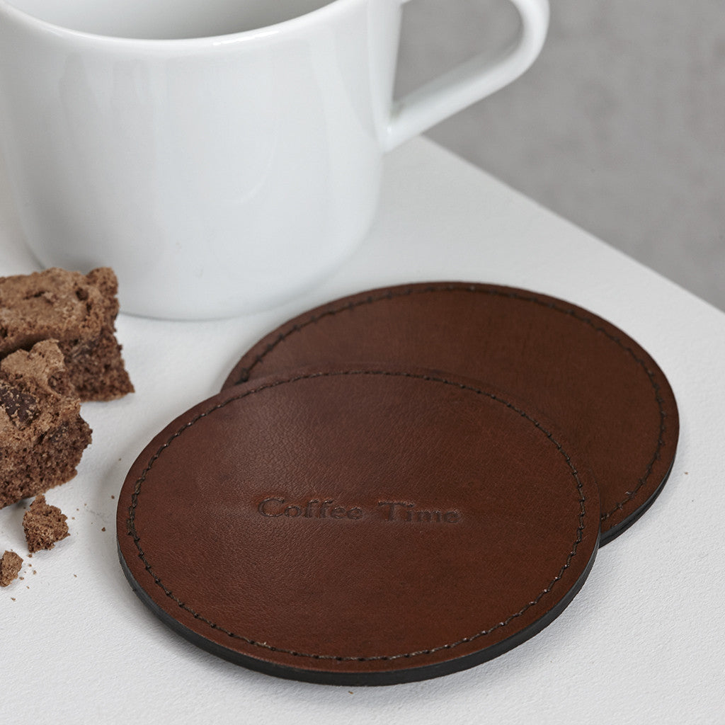 Round leather coaster with coffee time embossed