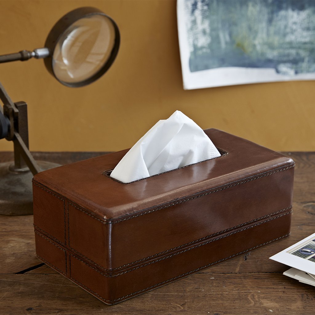 Leather tissue box in conker brown with tissues.