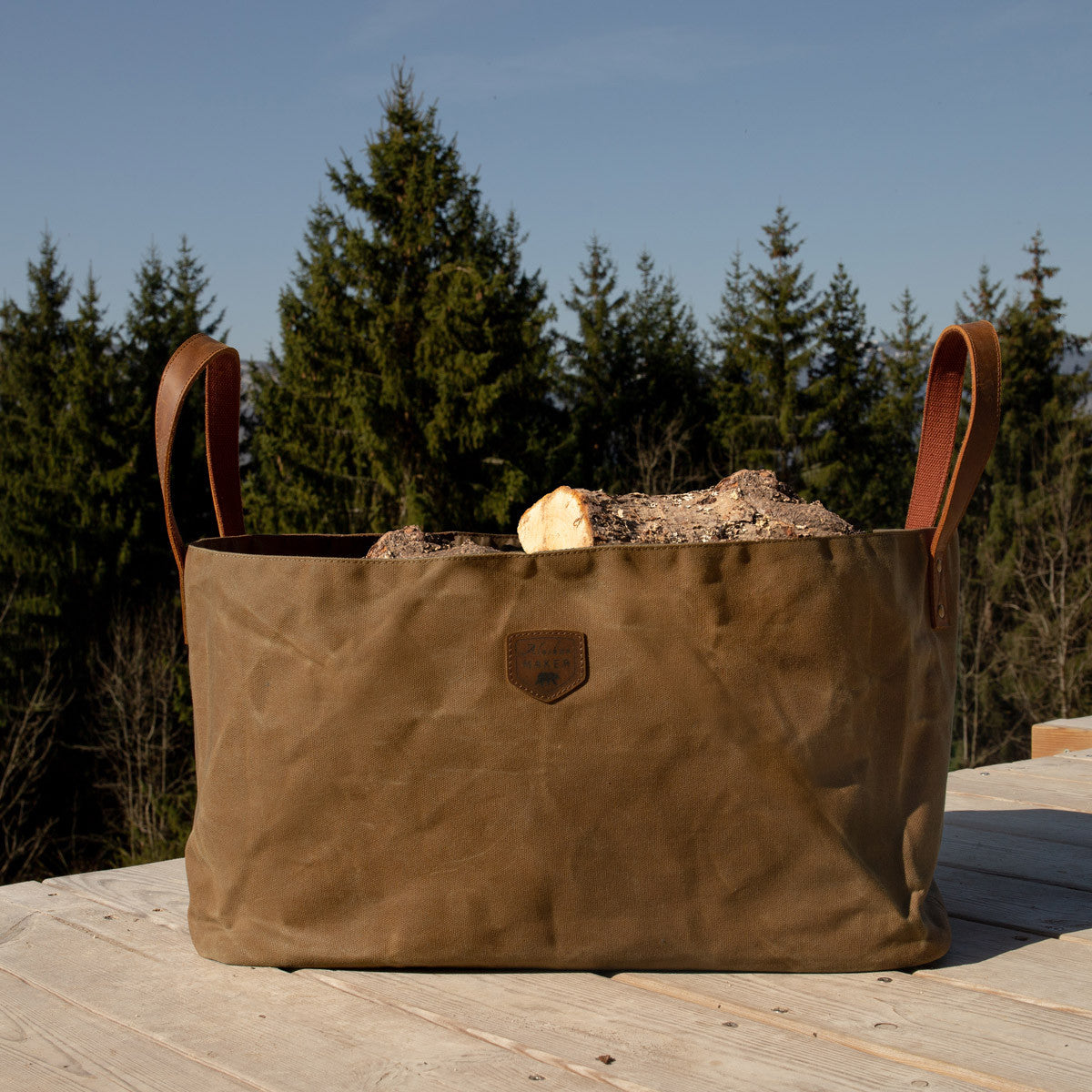 Large waxed canvas and leather log bag 
